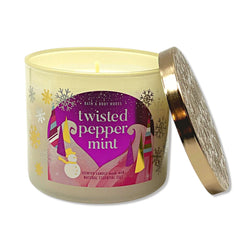 Bath & Body Works Twisted Peppermint 14.5 oz candle fills spaces with warmth.
