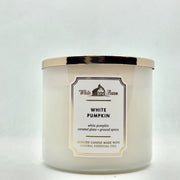 Bath & Body Works White Barn 3-Wick Candle with Essential Oils in White Pumpkin jar for autumn ambiance.