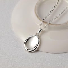 BBPM worry stone necklace worn silver with chain, versatile style for meditation and focus