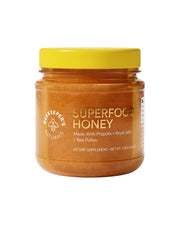 Beekeeper's Naturals Superfood Honey bottle with golden drizzle illustrating natural energy