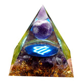 Besorgone Orgone Pyramid EMF protection near devices for calm focus.