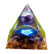 Besorgone Orgone Pyramid EMF protection near devices for calm focus.