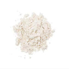 BEYOND RAW L-Carnitine powder mixing glass ready for quick pre-workout blends.
