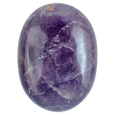 BEZAVO Amethyst Oval Palm Stone closeup showing a polished surface for meditation and focus