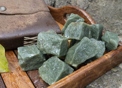BEZAVO green aventurine rough stones closeup showing natural texture.