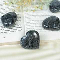 BEZAVO larvikite-reiki crystal heart enhances grounding during healing sessions.