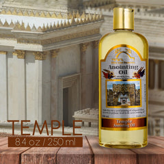 Pouring Bible Land Treasures Anointing Oil during devotional blessing ceremony.