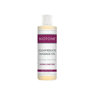 Biotone Clear Results Massage Oil bottle provides a smooth glide for at-home spa use.