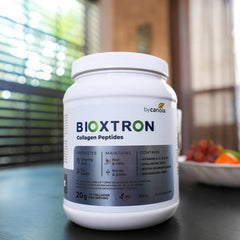 Bioxtron Collagen Peptides powder with spoon for easy daily use.