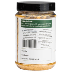 Open jar of Bilva Powder by Bixa Botanical.