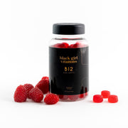 Black Girl Vitamins B12 gummies bottle with raspberry flavor for daily energy.