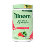 Bloom Nutrition Greens powder bottle pouring to show convenient daily greens boost