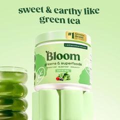 Bloom Nutrition greens powder in smoothie glass for a quick energy boost.