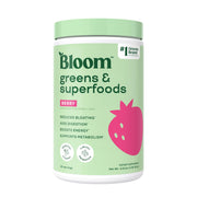Bloom Nutrition superfood greens powder in apple cider tub for daily wellness.