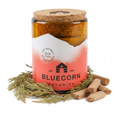 Bluecorn Beeswax 3-Wick Candle in amber glass emits a warm, natural glow