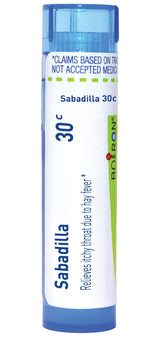 Boiron Sabadilla 30C pellets in dispensing tube for on-the-go relief.