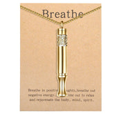 Bolagtier Anxiety Relief Pendant in gold with diffuser pad for calming breathing