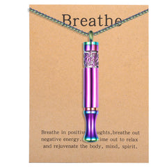 BOLAGTIER anxiety-relief pendant with rainbow finish for on-the-go mindfulness.