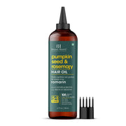 Botanic Hearth hair oil bottle pours for easy scalp nourishment.