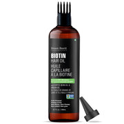 Botanic Hearth Hair Oil bottle pour for easy scalp nourishment and shine.
