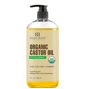 Botanic Hearth Massage Oil bottle on a towel for relaxation.