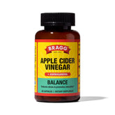 Bragg Daily Balance bottle on a kitchen counter showing branding for daily wellness