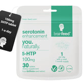 Brain Feed serotonin tablet close-up showing 100 mg 5-HTP for mood support.