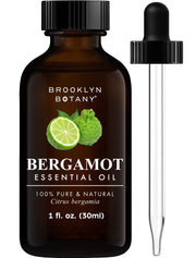 Brooklyn Botany bergamot essential oil bottle with dropper for precise aroma diffusion.
