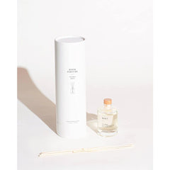Wooden cap of Brooklyn Candle Studio Santorini diffuser emphasizing secure seal