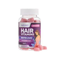 Built by Nature Hair Vitamins bottle on a clean background promoting convenient daily hair care.