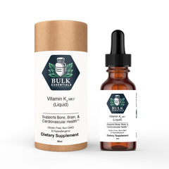 Bulk Essentials K2 MK-7 drops bottle on a clean kitchen counter for daily use.