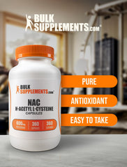 BulkSupplements NAC capsules with glass measure suggesting controlled intake.