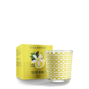 Caldrea Sea Salt Neroli candle closeup shows patterned glass and long-lasting aroma.