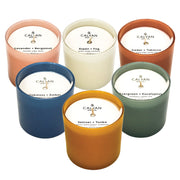 Calyan Wax Co. Dignity Aspen & Fog candle in a ceramic jar adds cozy fragrance.