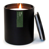 Calyan Wax Co. Fir & Clove candle in jar delivers warm pine and spice aroma for cozy evenings.