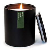Calyan Wax Co. Fir & Clove candle in jar delivers warm pine and spice aroma for cozy evenings.