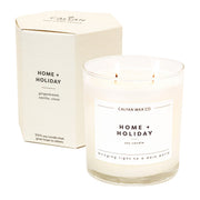 Calyan Wax Co. Home & Holiday 2 Wick Candle in a glass jar offers long-lasting fragrance.