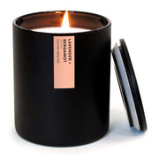 Calyan Wax Co lavender bergamot scented candle in a black tumbler for calming bedroom ambiance.