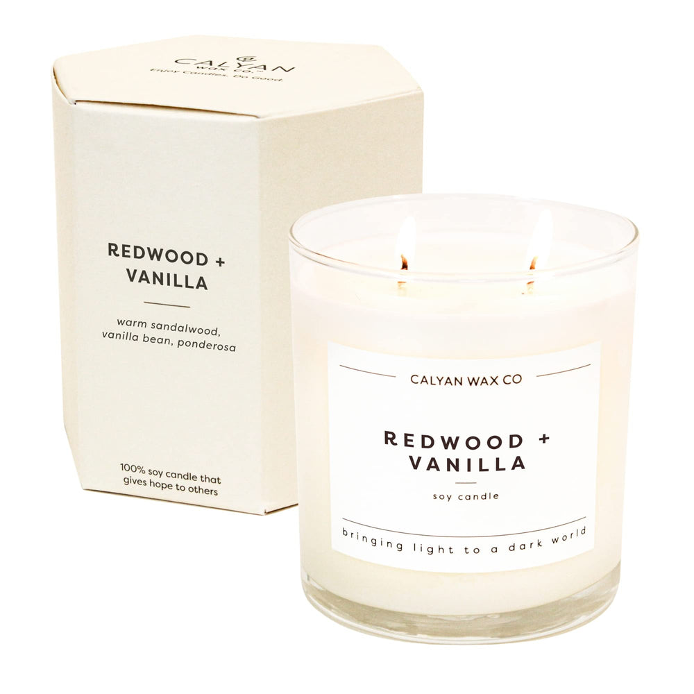 Calyan Wax Co Redwood and Vanilla candle in a large jar with long-lasting fragrance