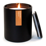 Calyan Wax Co. Redwood & Vanilla candle in black tumbler creates warm, inviting ambiance.