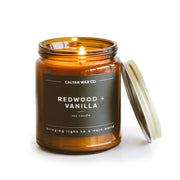 Calyan Wax Co Redwood & Vanilla candle in amber jar for a warm, inviting ambience.