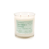 Calyan Wax Co Sea Mist & Freesia 2-wick candle in a glass jar for living rooms.