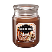 Candle-lite Cinnamon Rolls 18oz candle warming a living room ambiance