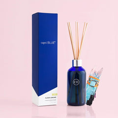 Capri Blue Aloha Orchid diffuser sticks distributing fragrance throughout your space