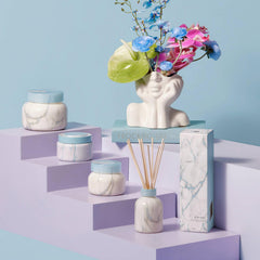 Capri Blue diffuser in a living room creates cozy ambiance.