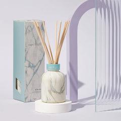 Capri Blue Blue Jean diffuser reeds spread fragrance through stylish sticks.