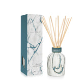 Capri Blue Modern Marble Reed Diffuser Set glass bottle enhances any room ambiance.