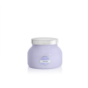 Capri Blue Volcano Lavender Petite Jar candle in a chic setting, offering a mood-lifting fragrance