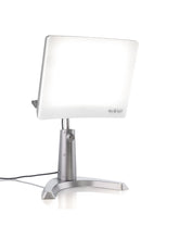 Carex Day-Light Classic Plus at 12 inches delivers bright, comfortable exposure.