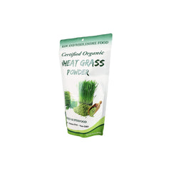 Cherie Sweet Heart wheatgrass powder jar open with scoop for daily use.
